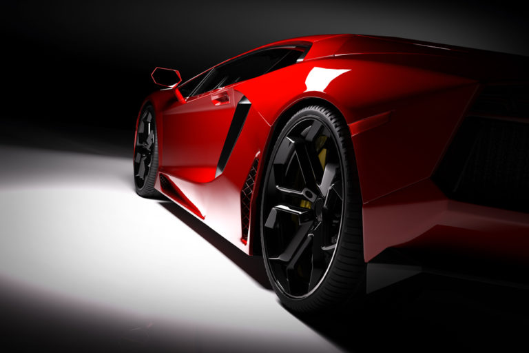 Red,Fast,Sports,Car,In,Spotlight,,Black,Background.,Shiny,,New,